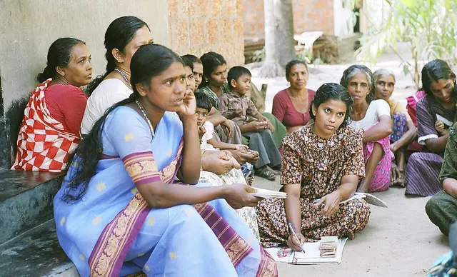 Women meeting in a village savings group